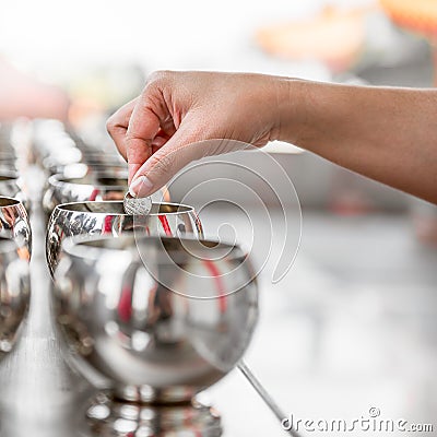 Buddhist donate money Stock Photo