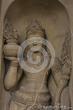 Buddhist Dvarapala Guardian Sculpture Flanking Entrance to Image House Stock Photo