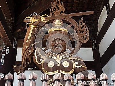 Buddhist guardian deity statue inside the gates of Nankobo, temple number 55 of Shikoku Editorial Stock Photo