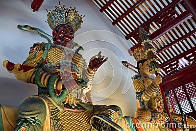 Buddhist guardian statue at a Chinese temple. Stock Photo