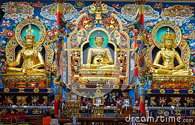 Buddhist idols in a buddhist monastery in South India Stock Photo