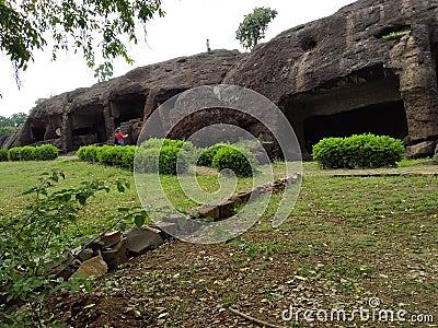 Buddhist monastery caves largest caves green plants natural nature environmen siharas and cells for monk stone history historical Stock Photo