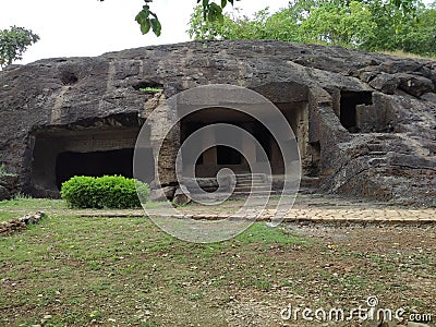 Buddhist monastery caves largest caves siharas and cells for monk stone history historical Stock Photo