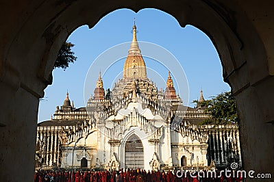 Buddhist monk before Ananda Pahto Temple in archaeological complex in Bagan Editorial Stock Photo