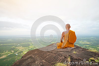 Buddhist monk in meditation at beautiful nature Editorial Stock Photo