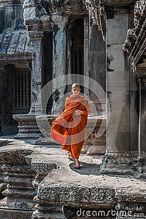 Buddhist monk walking in angkor wat cambodia Editorial Stock Photo