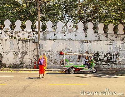 Buddhist monk walking to the temple in Ayutthaya Bangkok, Thailand Editorial Stock Photo