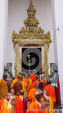 Buddhist monks enter Wat Pho Editorial Stock Photo