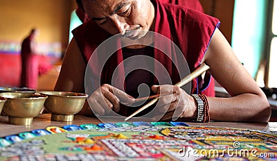 Buddhist monks making sand mandala Editorial Stock Photo