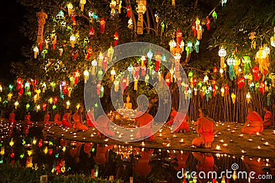 à¸ºBuddhist monks pray in light candle Editorial Stock Photo