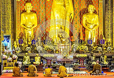 Buddhist monky praying in Wat Chedi Luang temple in Chaing Mai Editorial Stock Photo