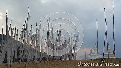 Buddhist prayer flags in eastern Bhutan, with ancient stupas Stock Photo