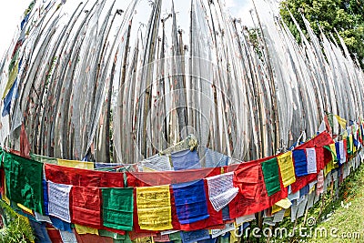 Buddhist prayer flags shot by fisheye Stock Photo