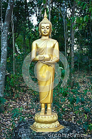 Buddhist Sculpture - Buddha Holding an Alms Bowl Stock Photo