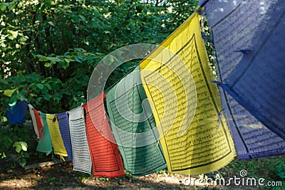 Buddhist Tibetan prayer flag colorful flag is different in five color meanings. Stock Photo