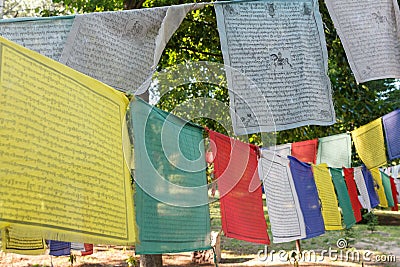 Buddhist Tibetan prayer flag colorful flag is different in five color meanings. Stock Photo