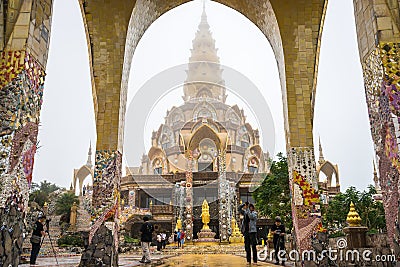 Buddhist tourists sightseeing beautiful Buddhist church Editorial Stock Photo