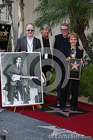 Buddy Holly, Gary Busey, Maria Elena Holly, Peter Asher, Phil Everly
