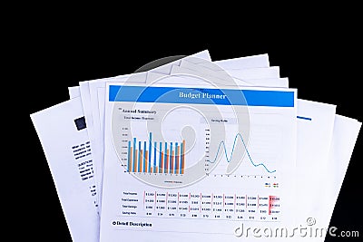 Budget Planner balance sheet documents paper with black background and top view, Business and Office concept. Stock Photo