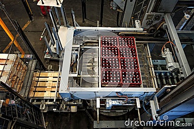 Budvar Budweiser brewery. Bottle sorting, washing and beer bottling workshop with assembly-lines. Editorial Stock Photo