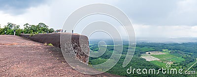 Bueng Kan, Thailand - July 30, 2022: Tourists stand on the Three Whale Rocks, Three whale rocks, a famous tourist Editorial Stock Photo