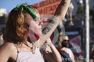 Young woman in a rally defending the legal abortion law. Buenos Aires, Argentina Editorial Stock Photo