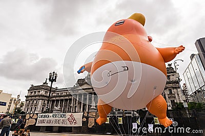 Buenos Aires, Argentina - November 29, 2018: Trump baby blimp doll at protests Editorial Stock Photo