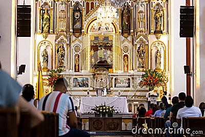 People at the Interior of the Minor Basilica of the Lord of Miracles located in Buga Editorial Stock Photo
