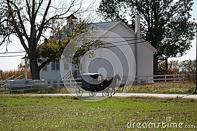 Buggy Passes Amish School Editorial Stock Photo