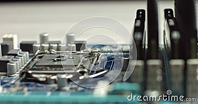 Build computer concept. Close-up shot of applying thermal paste on cpu. 4k footage. Close-up of smudging hermal paste on Stock Photo