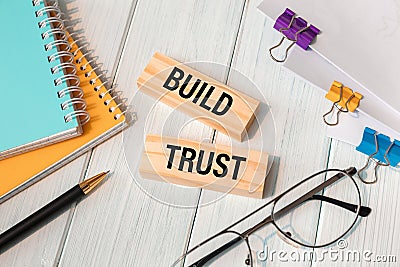 BUILD TRUST - words written on wooden blocks Stock Photo