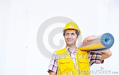 Builder is carrying insulation rolls on white background Stock Photo