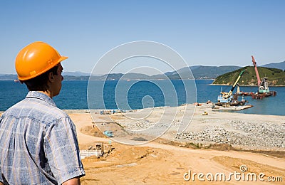 Builder.Construction of new seaport. Stock Photo