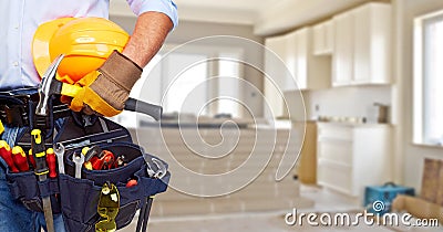 Builder handyman with construction tools. Stock Photo