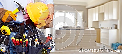 Builder handyman with construction tools. Stock Photo