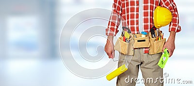 Builder handyman with paint roller. Stock Photo