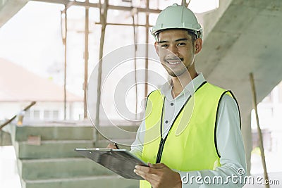 Builder inspection consultancy. Inspector checking material and structure in construction Stock Photo