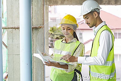 Builder inspection consultancy. Two engineer consulting and checking material and structure in construction Stock Photo