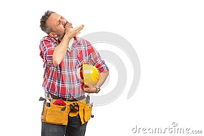 Builder preparing for work as stretching neck Stock Photo