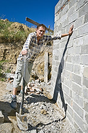 Builder with spade Stock Photo