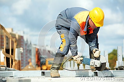 Builder working with cutting grinder Stock Photo
