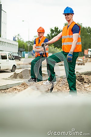 Builders having break Stock Photo