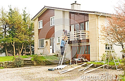 Builders at work: home improvements. Stock Photo