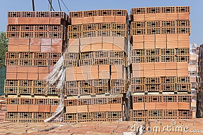 Building blocks stacked on pallets Stock Photo