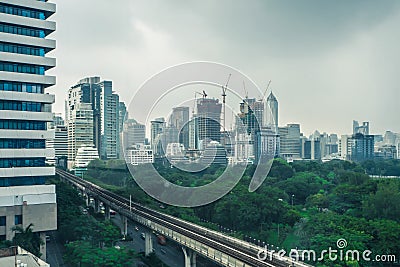 Building in the city with Electric Railway Train in Bangkok Thai Editorial Stock Photo