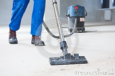 Building cleaning service. dust removal with vacuum cleaner Stock Photo