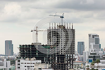 Building construction in a heavily congested urban area Stock Photo