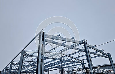 Building construction from metal trusses. lattice structure of the frame of Stock Photo
