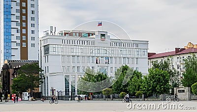 The building of the Council of Deputies of the city of Grozny with portraits of Vladimir Putin and Akhmad Kadyrov on the facade Editorial Stock Photo