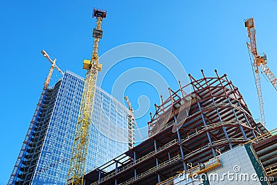 Building with cranes Stock Photo